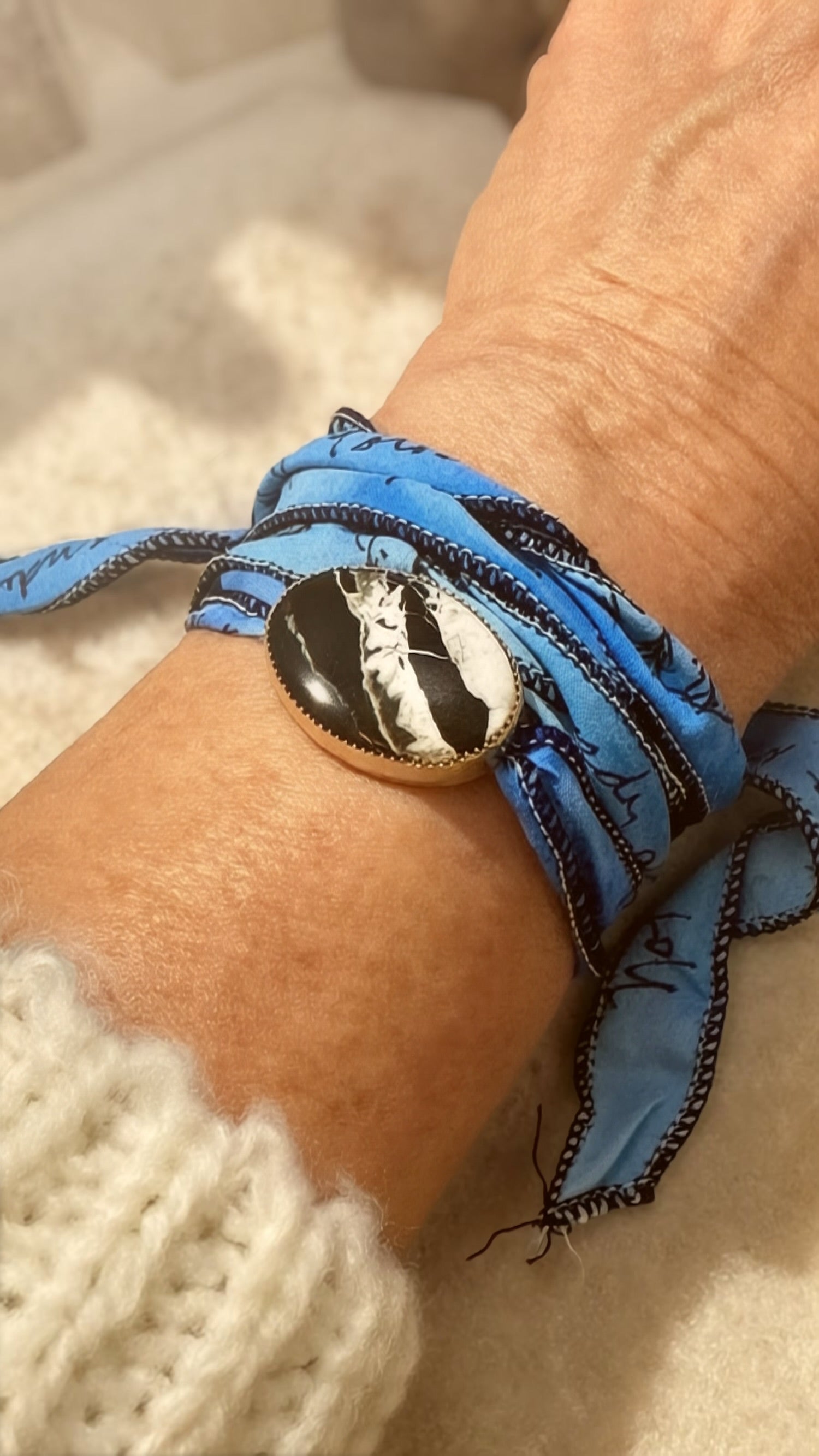 White Buffalo stone silk wrap bracelet in fine and sterling silver on hand-dyed silk.