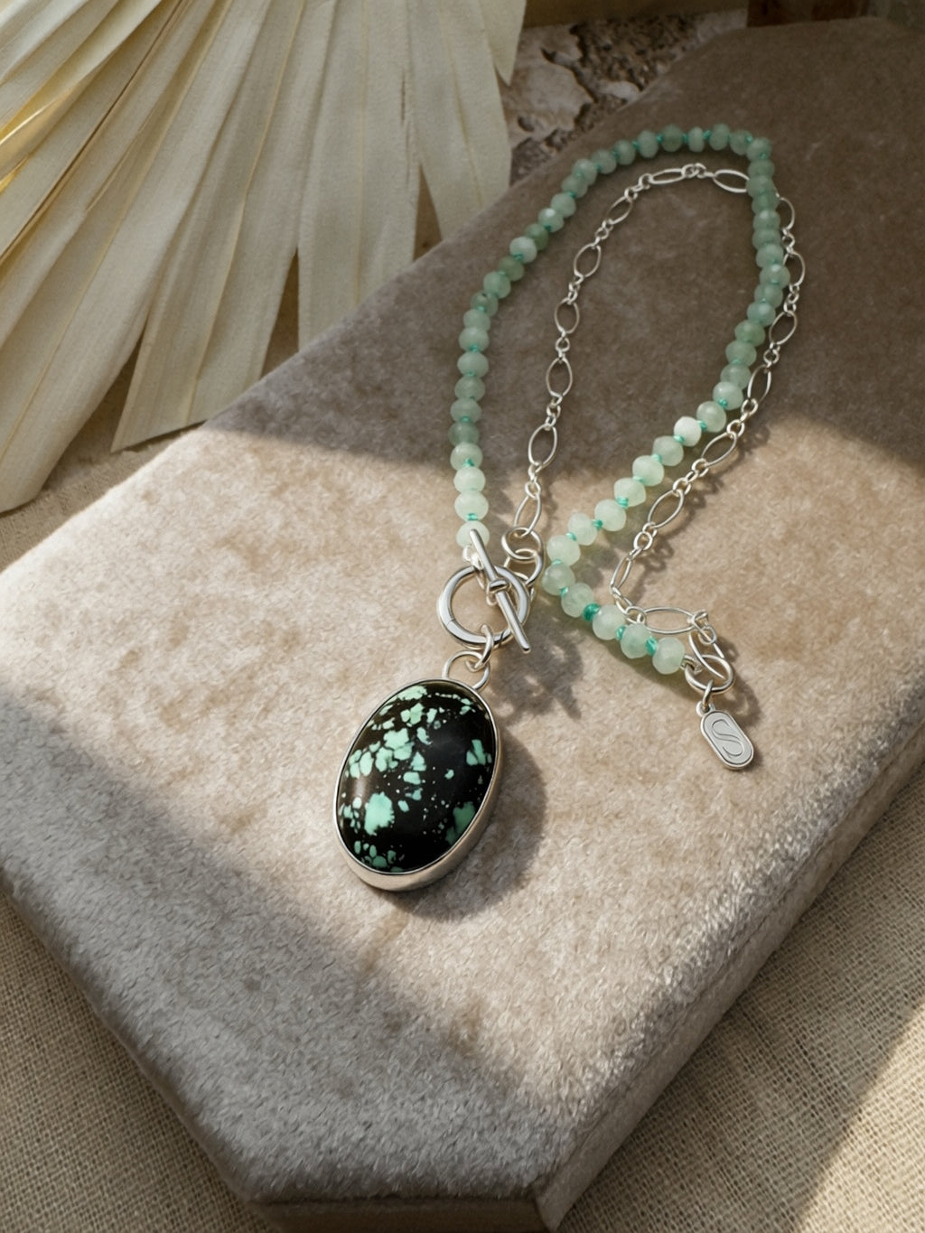 Handmade sterling silver Carico Lake Variscite charm keeper toggle necklace with hand-knotted seafoam rondelles and oval link chain, Sun Salt Silver Caye collection