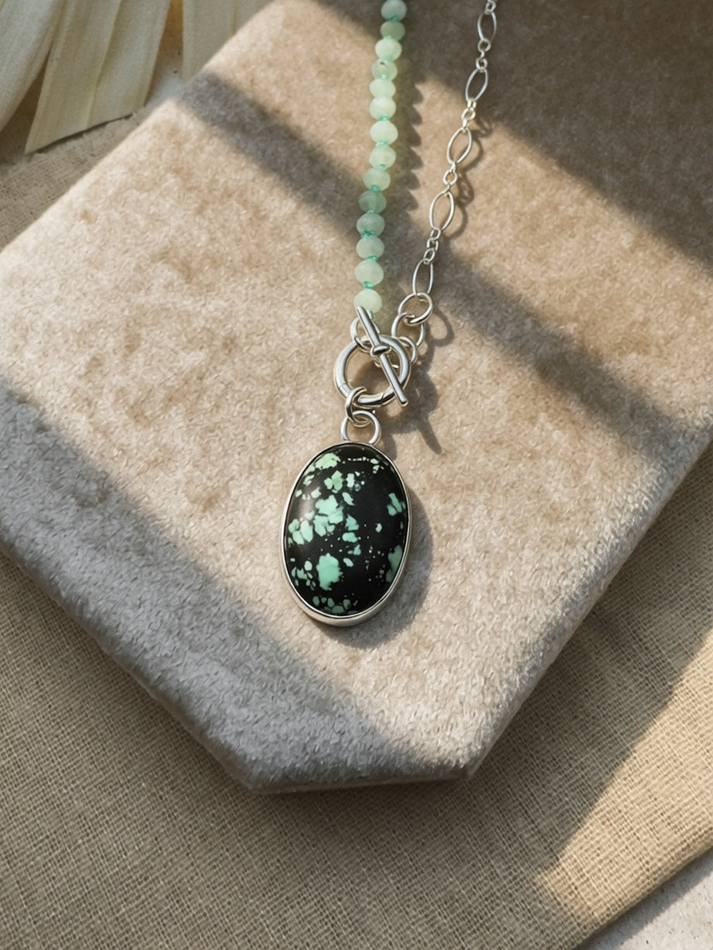 Handmade sterling silver Carico Lake Variscite charm keeper toggle necklace with hand-knotted seafoam rondelles and oval link chain, Sun Salt Silver Caye collection