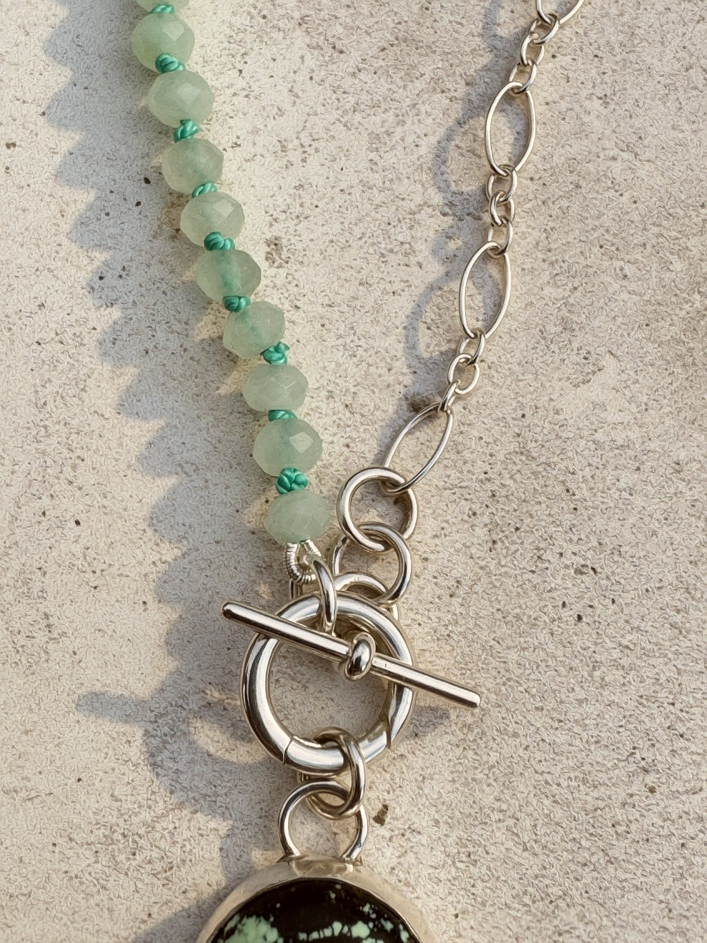 Sterling silver charm keeper toggle clasp Sun Salt Silver Caye collection necklace detail