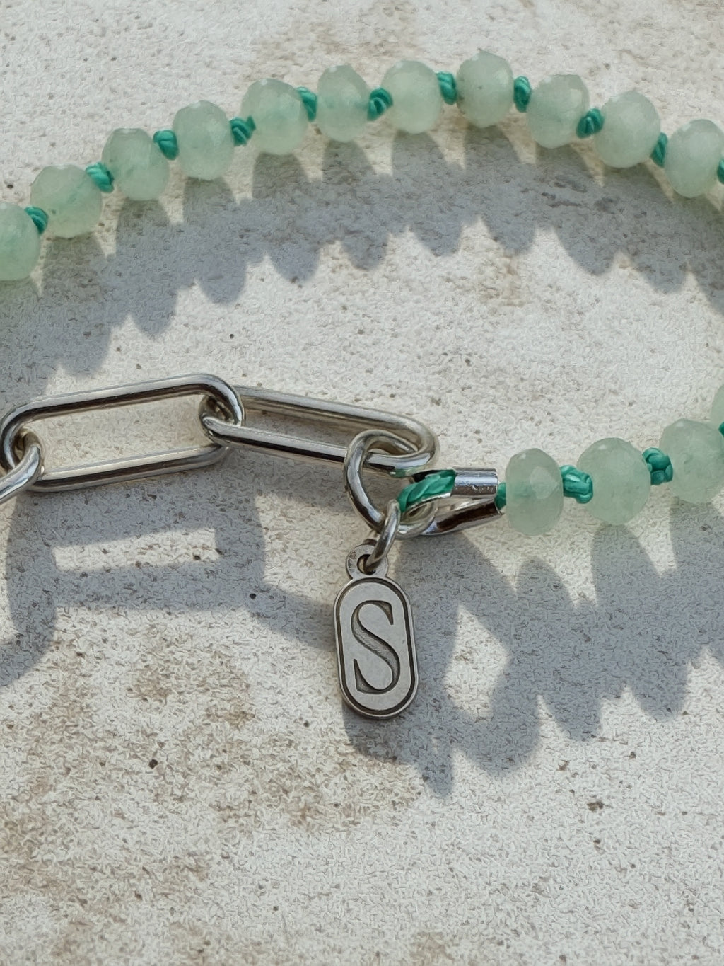 Hand-knotted teal silk seafoam rondelle necklace with serrated bezel set turquoise cabochon and sterling silver charm keeper toggle clasp, Sun Salt Silver