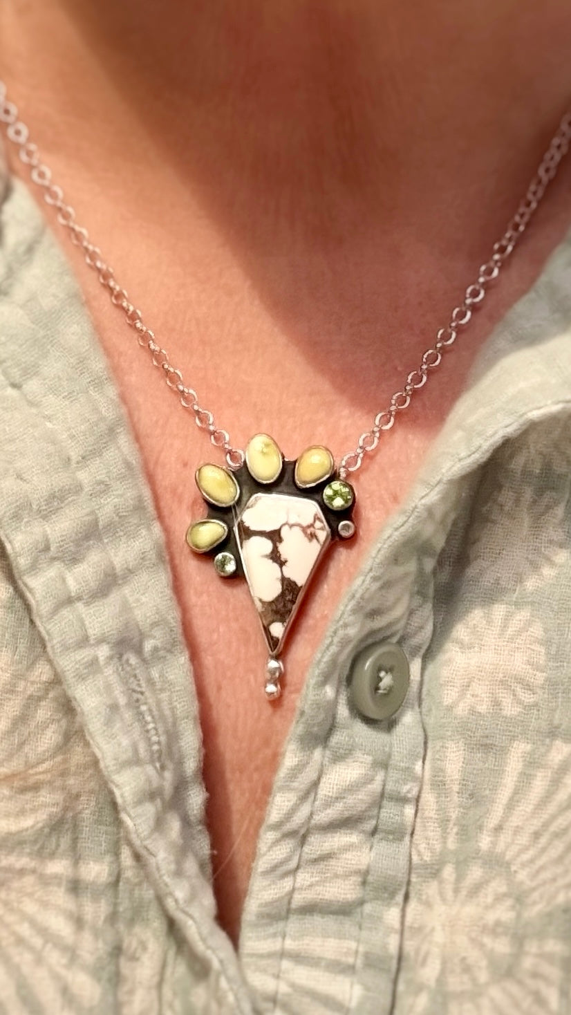 Close up of Woman wearing wild horse stone pendant necklace on 18-inch sterling silver chain