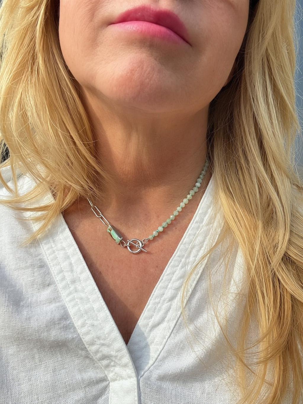 Handmade sterling silver turquoise charm keeper necklace with seafoam rondelle beads on hand-knotted teal silk, worn at collarbone, Sun Salt Silver Caye collection