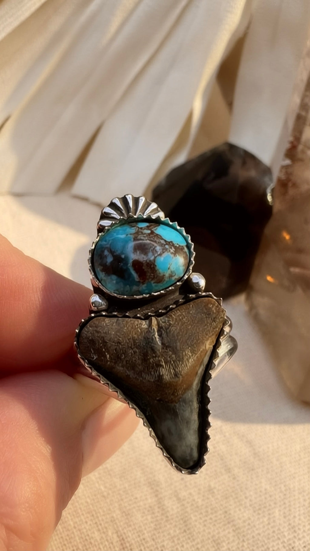 Close-up of Bisbee turquoise stone with chocolate brown matrix in handmade ring