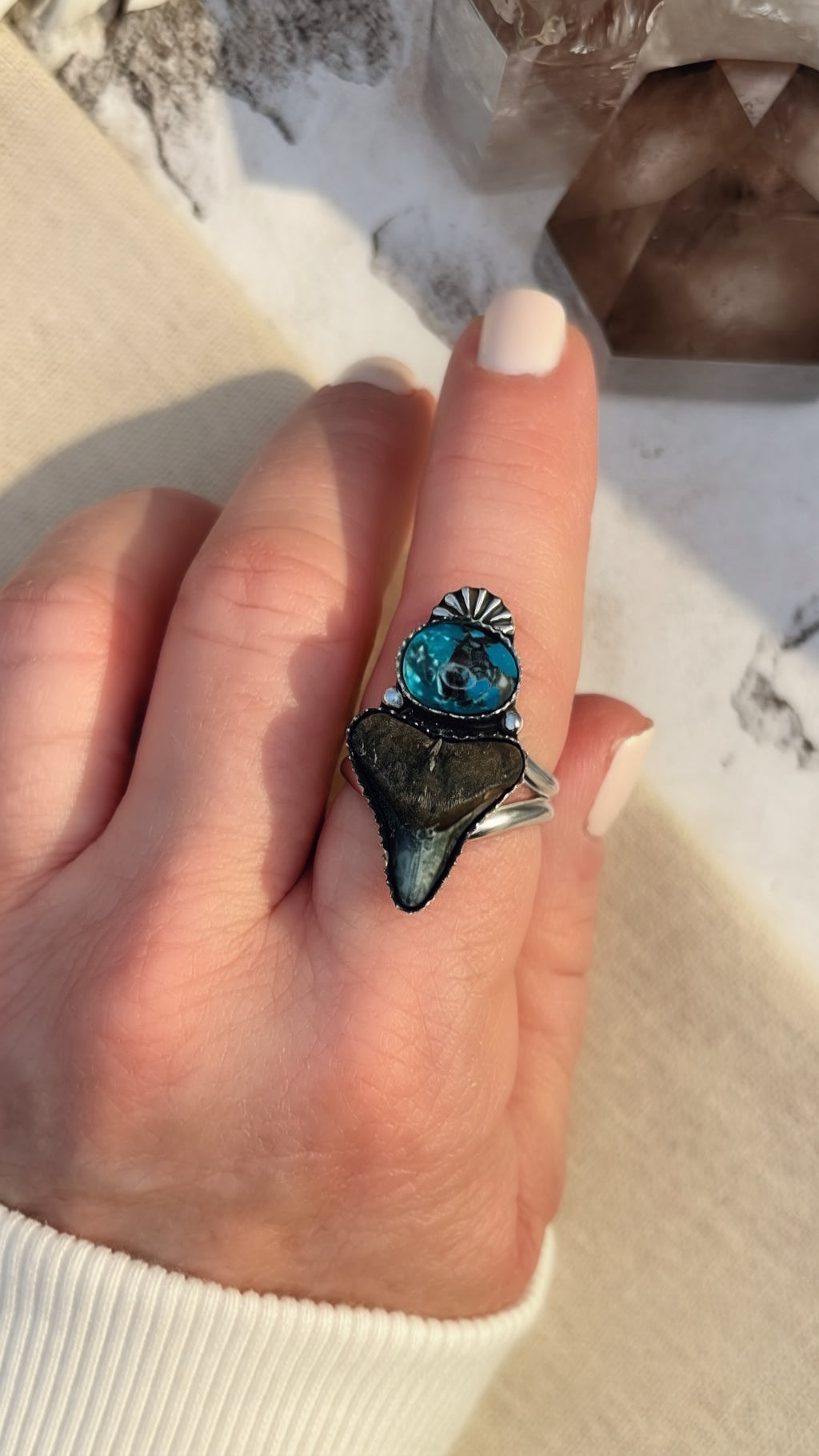 Close-up of Bisbee turquoise stone with chocolate brown matrix in handmade ring