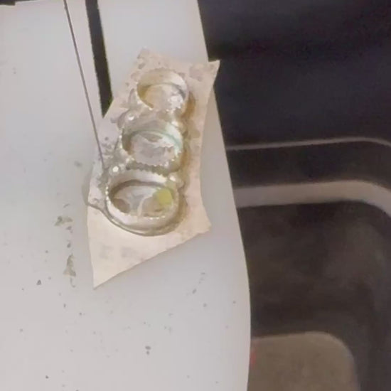 Behind the scenes look at the triple turquoise stone ring being made.